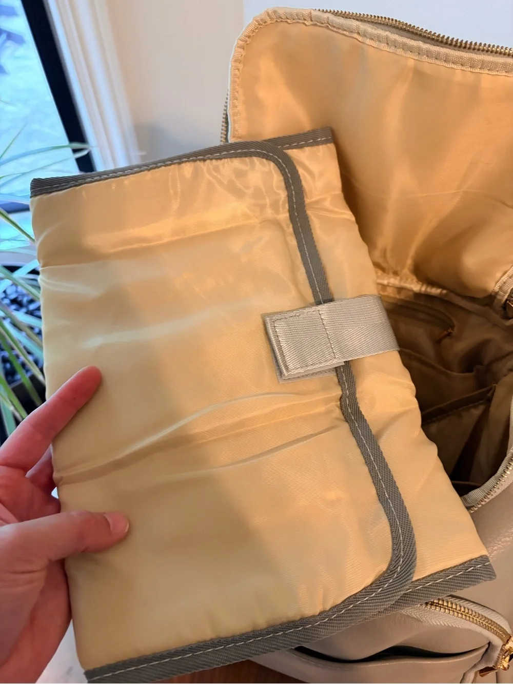 Stylish Cream Baby Bag Backpack with Gold Hardware